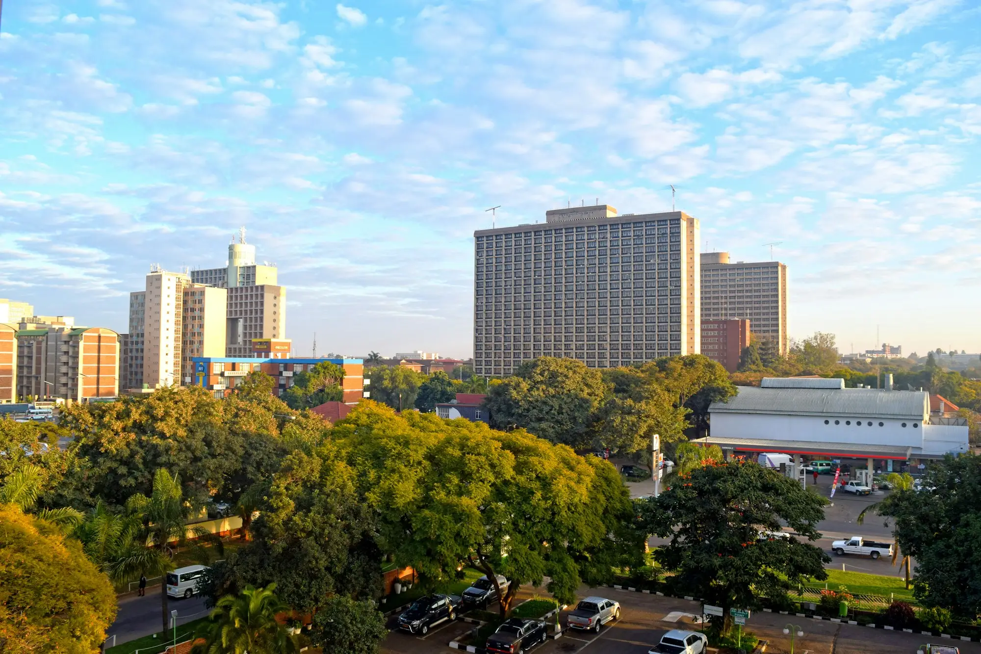 A city skyline of tall office buildings