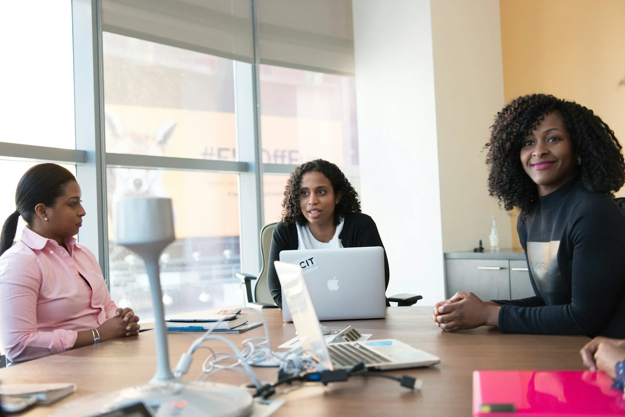 Consultants working through data with a client team